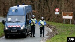 French gendarmes block access to the town of Dammartin-en-Goele, France, on Jan. 9, 2015.