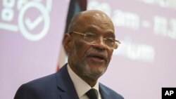 Perdana Menteri Haiti Ariel Henry memberikan kuliah umum di Universitas Internasional Amerika Serikat (USIU) di Nairobi, Kenya, pada 1 Maret 2024. (Foto: AP)