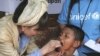 FILE - Renowned Japanese actress Tetsuko Kuroyanagi who is a UNICEF Goodwill Ambassador gives an Indonesian boy a measles vaccination Thursday Feb. 3, 2005 in the remote village of Keudai Tenom on Aceh's West coast.