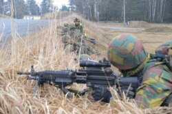 FILE - Belgian soldiers conduct training at the Grafenwoehr Training Area, as part of the European Union's Battle Group 2014-02, Feb. 21, 2014. (US Army photo)