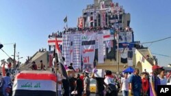 Aksi unjuk rasa anti-pemerintah di Tahrir Square, Baghdad, Irak, 1 November 2019. (Foto AP / Khalid Mohammed).