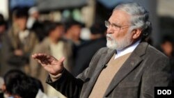 FILE - Sayed Fazlullah Wahidi gives a speech at a cricket tournament near Forward Operating Base Wright, Kunar Province, Afghanistan, Feb. 02, 2010.