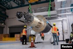 The 3200-megapixel LSST digital astronomy camera, the highest-resolution camera in the world, is lifted inside Vera C. Rubin Observatory venue, at Cerro Pachon area, in Coquimbo region, Chile May 18, 2024. (Olivier Bonin/SLAC National Accelerator Laboratory/Handout via REUTERS)