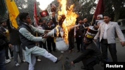 Yan shiya sun kone kamanin sarkin Saudiya Salman Ibn Abdulaziz