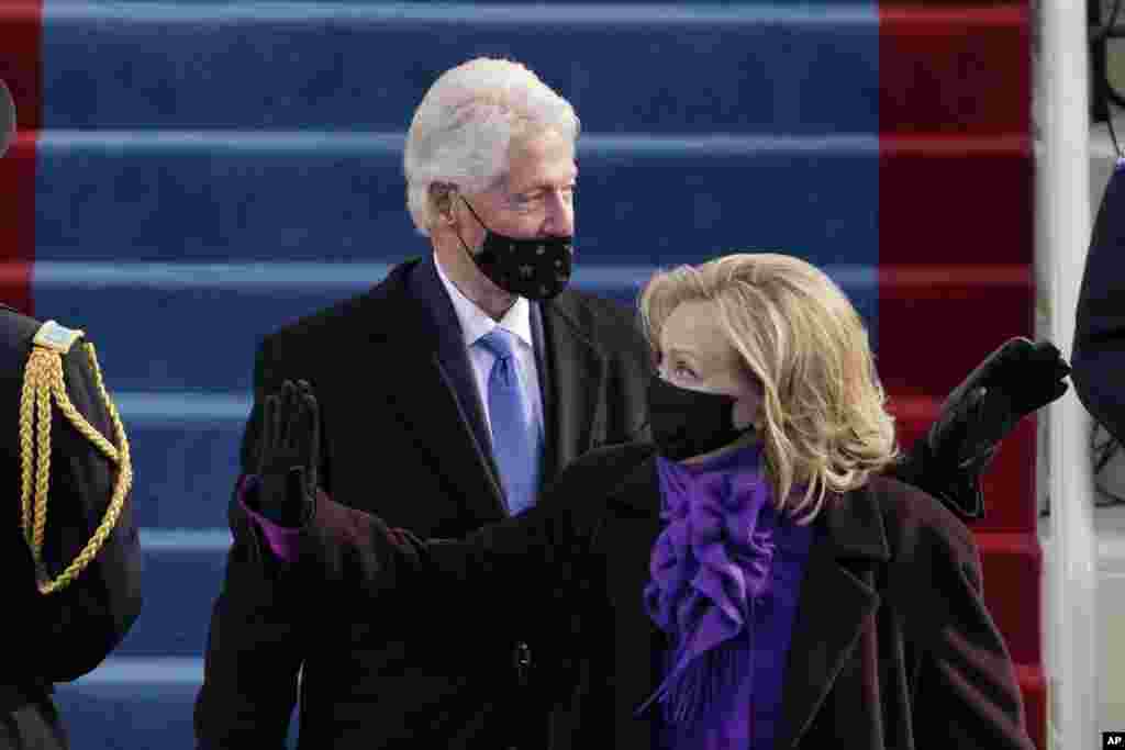 Former President Bill Clinton and his wife former Secretary of State Hillary Clinton arrive for the 59th Presidential Inauguration at the U.S. Capitol for President-elect Joe Biden in Washington, Wednesday, Jan. 20, 2021. (AP Photo/Patrick Semansky, Pool)