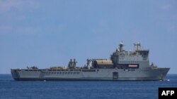 FILE - A handout photo from the British Ministry of Defense on April 26, 2024, shows Royal Navy support ship Cardigan Bay at work in the Red Sea. Cardigan Bay will help support the international effort to construct a temporary floating pier in Gaza to deliver humanitarian aid.