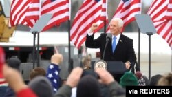 Vice President Mike Pence speaks to supporters at a pre-election rally in Hibbing, Minnesota, Oct. 26, 2020.