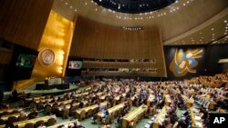 People gather at the General Assembly, prior to a vote, Dec. 21, 2017, at United Nations headquarters in New York.
