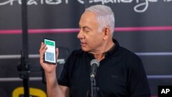 នាយករដ្ឋមន្ត្រី​អ៊ីស្រាអែល​លោក Benjamin Netanyahu ថ្លែង​សុន្ទរកថា​អំពី​​លទ្ធផល​នៃ​ការ​ចាក់​វ៉ាក់សាំង​កូវីដ១៩​ដល់​ពលរដ្ឋ​របស់​ខ្លួន​ ក្រុង Petah Tikva ប្រទេស​អ៊ីស្រាអែល ថ្ងៃទី២០ ខែកុម្ភៈ ឆ្នាំ២០២១។