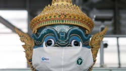 A Thai traditional giant statue wears a protective mask, amid the coronavirus disease (COVID-19) pandemic, at Suvarnabhumi Airport in Bangkok, Thailand Dec. 15, 2020.