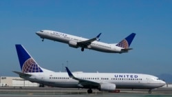 FILE - United Airlines airplanes are seen at San Francisco International Airport in San Francisco, Oct. 15, 2020.