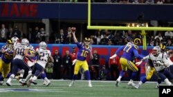 Los Angeles Rams' Jared Goff (16) throws during the first half of the NFL Super Bowl 53 football game between the Los Angeles Rams and the New England Patriots, Feb. 3, 2019, in Atlanta, Georgia. 