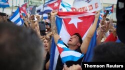 People rally in solidarity with protesters in Cuba, in Little Havana neighborhood in Miami.