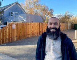 Daniel Echebarria, a 39-year-old supporter of President Donald Trump, poses for a picture in Carson City, Nev., where he works as a teacher.