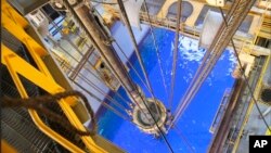 FILE - An oil industry facility is seen in the Gulf of Mexico, in this July 13, 2017, photo released by the U.S. Bureau of Safety and Environmental Enforcement.