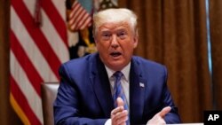 FILE - President Donald Trump speaks in the Cabinet Room of the White House, June 15, 2020, in Washington. 