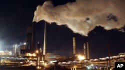 Smoke bellows from a chimney stack at BlueScope Steel's steelworks at Port Kembla, south of Sydney, Australia, July 8, 2011 (file photo).