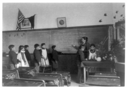 Elementary school class of Indian students with botanical specimens at United States Indian School, Carlisle, Pennsylvania. Photo by Francis Benjamin Johnson, Dec. 31, 1900