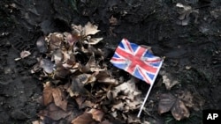 FILE - A British Union flag lies on the ground in Parliament Square, London, Feb. 1, 2020. 