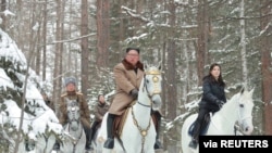 North Korean leader Kim Jong Un rides a horse as he visits battle sites in areas of Mt Paektu, Ryanggang, North Korea, in this undated picture released by North Korea's Central News Agency (KCNA), Dec. 4, 2019.