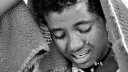 Photographer Aims Lens at Women in Crisis