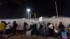 Migranti sa Kube i Venecuele na meksičkoj granici u Tihuani čekaju da apliciraju za azil u SAD, novembar 2024. 