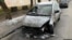 FILE - The burnt car of RFE/RL journalist Halyna Tereshchuk in is seen on a street in Lviv, western Ukraine. 