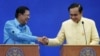 Cambodia's Prime Minister Hun Sen (L) and Thailand's Prime Minister Prayuth Chan-ocha shake hands during a news conference after an agreement signing ceremony at the Government House in Bangkok, Thailand, Dec.19, 2015.