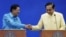 Cambodia's Prime Minister Hun Sen (L) and Thailand's Prime Minister Prayuth Chan-ocha shake hands during a news conference after an agreement signing ceremony at the Government House in Bangkok, Thailand, Dec.19, 2015.