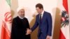 Iran's Rouhani In Vienna to Shore up Nuclear Deal, Dogged By Diplomat's Arrest