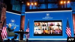 FILE - U.S. President-elect Joe Biden conducts a virtual meeting with officials, in Wilmington, Delaware, Nov. 17, 2020. 