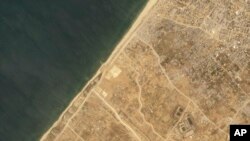 در تصویر ماهواره‌ای شرکت آمریکایی «پلانت لبز» محل ساخت اسکله در نزدیکی شهر غزه دیده می‌شود. آسوشیتدپرس. 
