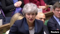 Britain's Prime Minister Theresa May speaks in the Parliament in London, April 3, 2019, in this screen grab taken from video. 