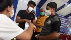 Ribuan pengungsi dari berbagai negara di Kota Medan, Sumatra Utara, divaksinasi COVID-19 , Rabu 8 Desember 2021. (Courtesy: Dokumentasi IOM)