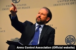 Washington, DC -- Daryl G. Kimball (left), Executive Director at the Arms Control Association, takes questions from the audience, in United States Institute of Peace on Monday, Sept. 15, 2014.