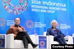 Jim Yong Kim dan Christine Lagarde meluncurkan Bali Fintech Agenda. (Foto courtesy: Bank Dunia).