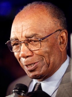 FILE - Former Boston Celtics standout Sam Jones speaks with reporters at The Sports Museum's annual fundraiser and awards ceremony, in Boston, June 24, 2009, where he received a Lifetime Achievement Award. Jones died Dec. 30, 2021, at 88.