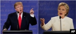 Republican presidential nominee Donald Trump and Democratic presidential nominee Hillary Clinton speak during the third presidential debate at UNLV in Las Vegas, Oct. 19, 2016.