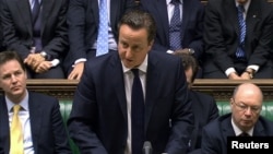 Britain's Prime Minister David Cameron speaks to parliament about the hostage situation in Algeria in London, January 18, 2013.
