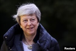 Britain's Prime Minister Theresa May leaves church, as Brexit turmoil continues, in Sonning, Britain, May 12, 2019.