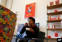 Shanelle Gabriel eats a bowl of cereal at Kellogg's NYC Cafe in New York, Dec. 14, 2017.