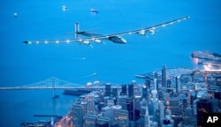 FILE - FILE - In this April 23, 2016 file photo, Solar Impulse 2 flies over San Francisco.