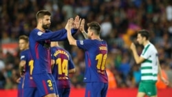 Gerard Piqué e Lionel Messi