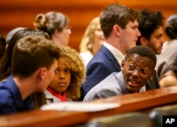 Youth plaintiffs in the Juliana v United States climate change lawsuit gather in a federal courthouse for a hearing in front of a panel of judges with the 9th Circuit Court of Appeals in Portland, Ore., on Tuesday, June 4, 2019.