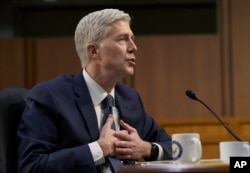 FILE - Supreme Court Justice nominee Neil Gorsuch testifies on Capitol Hill in Washington, March 22, 2017, during his confirmation hearing before the Senate Judiciary Committee.