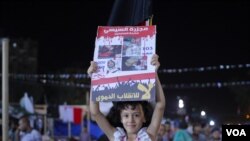 Pro-Morsi protesters say they are non-violent and unarmed, but they will still fight to protect the women and children living inside the camp. (Hamada Elrasam/VOA)