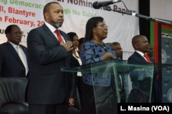 Vice President Saulos Chilima (left) and MEC chairperson Jane Ansah and others standing attention for the Malawi National Anthem during the nominantion presentation ceremony in Blantryre.