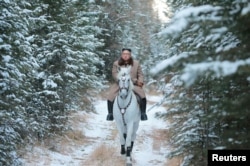 North Korean leader Kim Jong Un rides a horse during snowfall in Mount Paektu in this image released by North Korea's Korean Central News Agency (KCNA) on October 16, 2019.