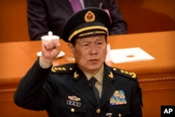 រូបឯកសារ៖ លោក​ Wei Fenghe​ រដ្ឋមន្ត្រី​ការ​ពារ​ប្រទេស​ចិន ស្បថចូលកាន់តំណែងនៅទីក្រុងប៉េកាំង ប្រទេសចិន កាលពីថ្ងៃទី១៩ ខែមីនា ឆ្នាំ២០១៨។