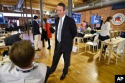 Mark Sanford, R-S.C., speaks to the media before the CBS News Republican presidential debate at the Peace Center, Feb. 13, 2016, in Greenville, S.C.